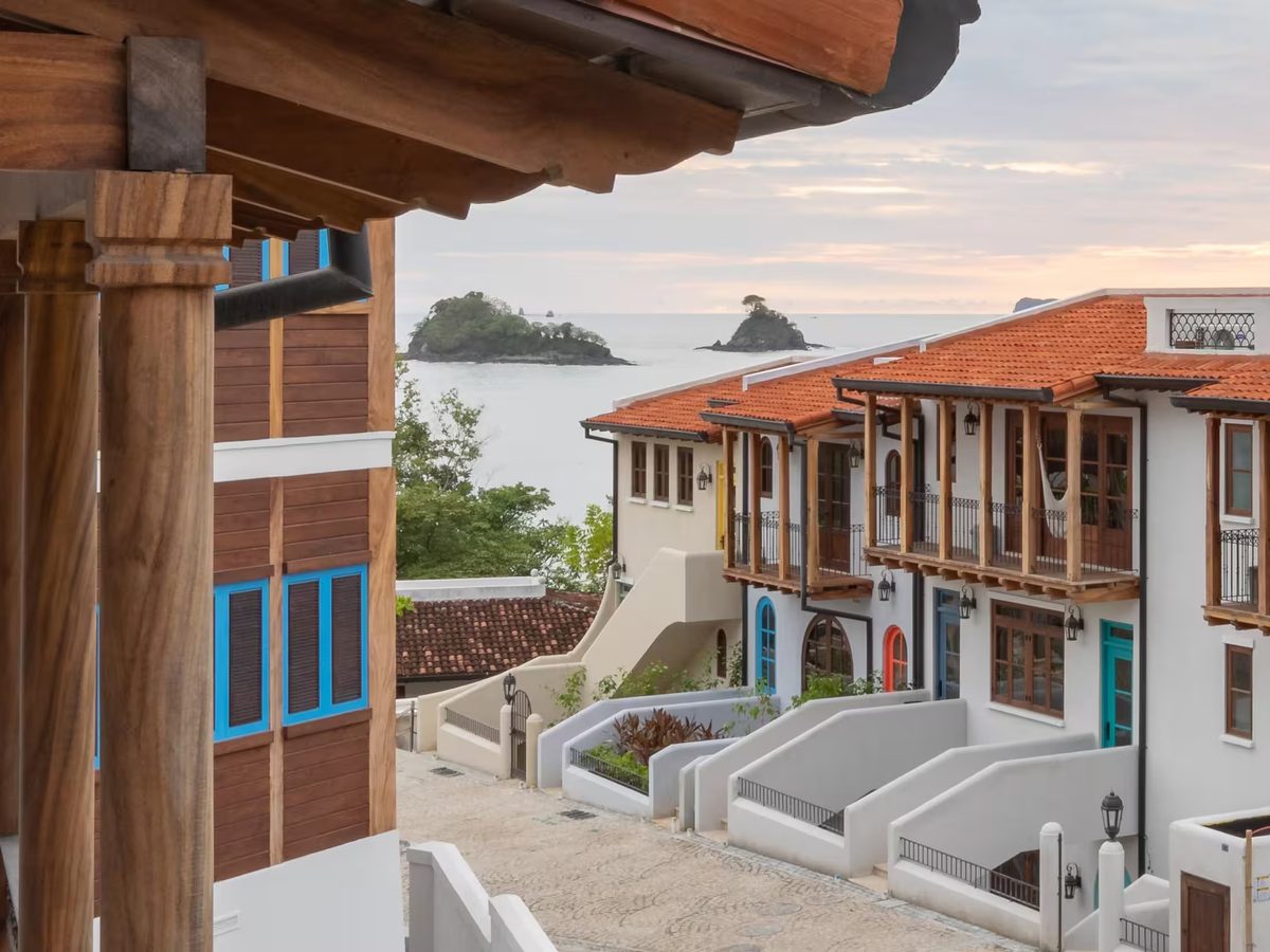 Townhomes along Calle Cartagena with the ocean and islands beyond